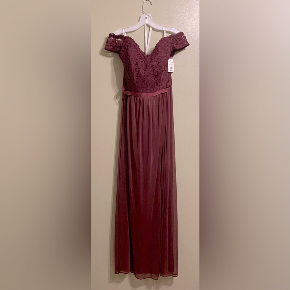 Wine color formal gown purchased for MOB but never worn. New with tags.